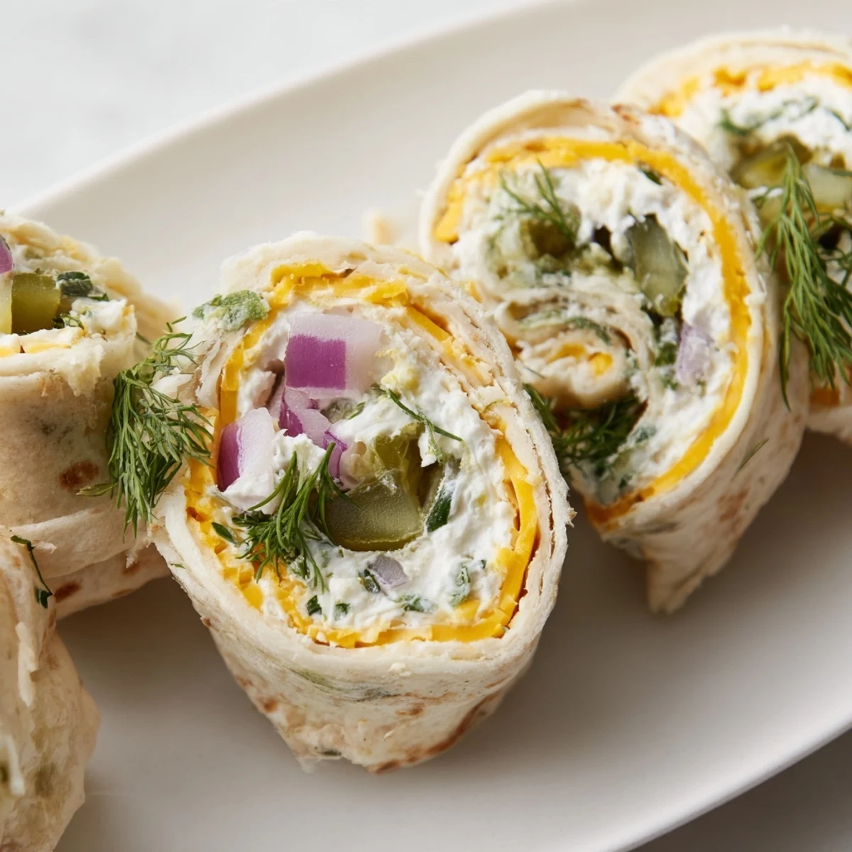 Deliciously creamy Pickle-in-a-Blanket, ideal for picnics and casual gatherings.