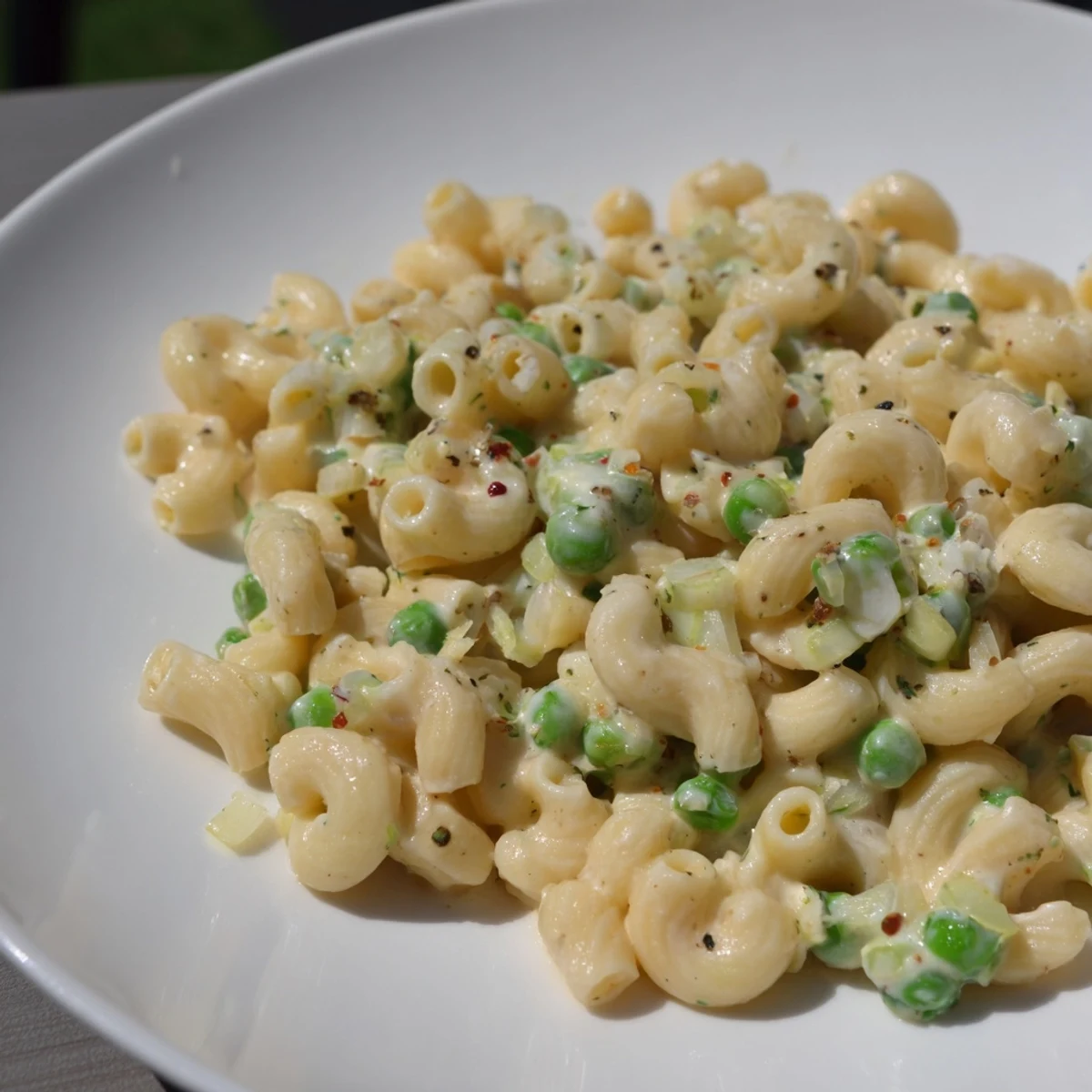 Golden macaroni & peas shimmering with butter, a quick & easy homemade vegetarian meal.
