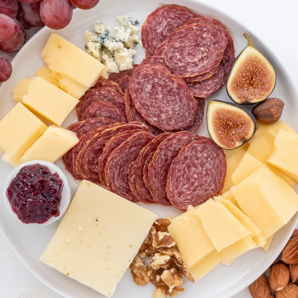 A stunning Deer Antler Charcuterie board overflowing with savory meats, cheeses, and rustic accompaniments.