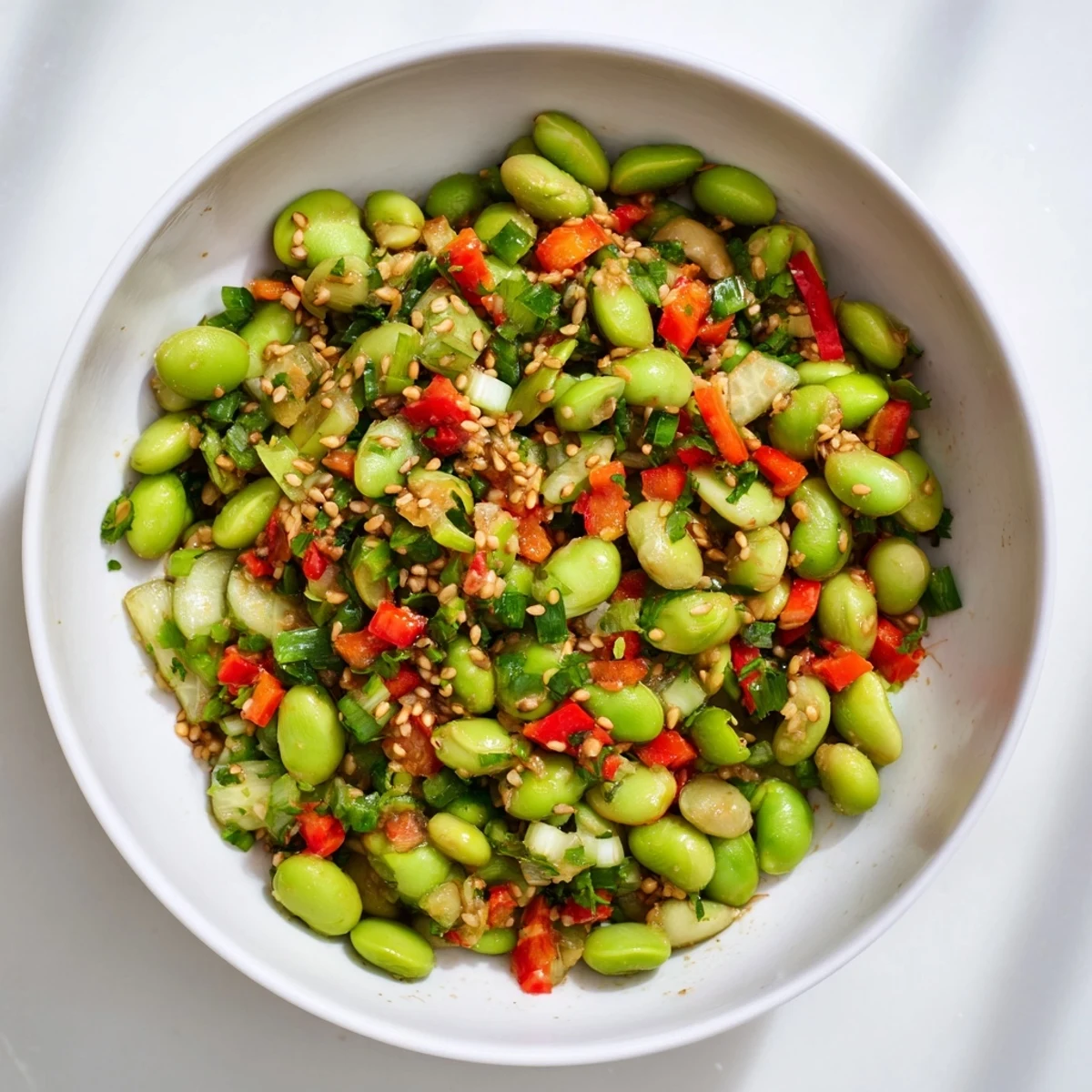 Vibrant edamame salad with crisp cucumber and a luscious sesame dressing, ready to eat.
