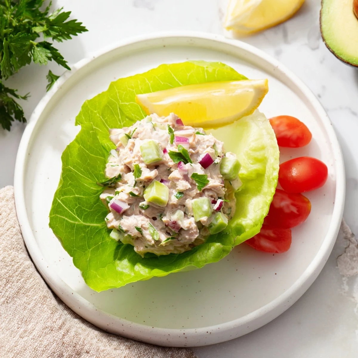 Close-up of fresh Tuna Salad Lettuce Wraps with creamy filling ready to be enjoyed.
