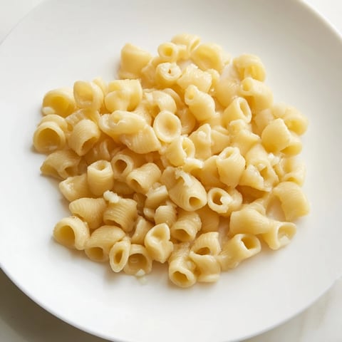 Creamy garlic butter coats perfectly cooked ditalini pasta in this easy comfort food recipe.