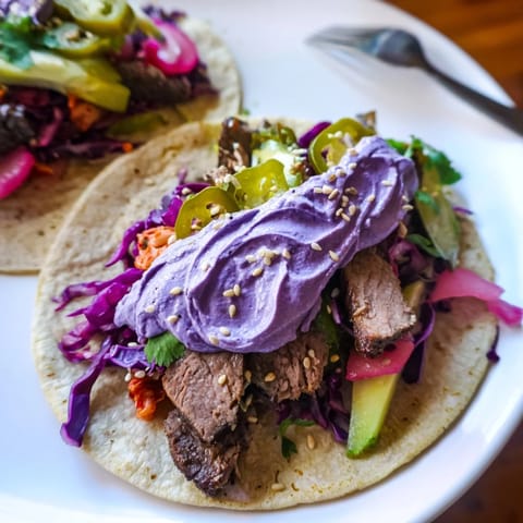 Flavorful Global Street-Food Fusion Bowls featuring protein, rice, and a colorful vegetable medley.  