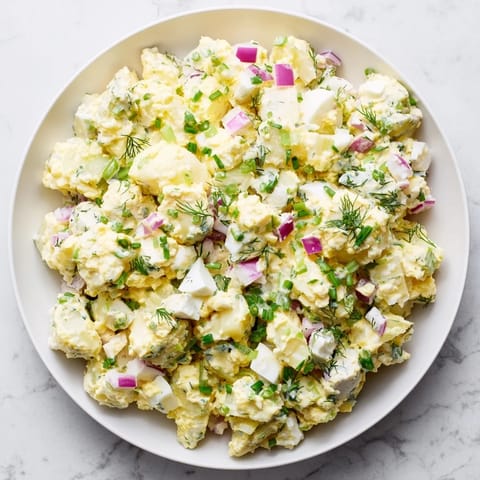 This Chopped Egg and Potato Salad shows off perfectly diced potatoes mixed with flavorful dressing.