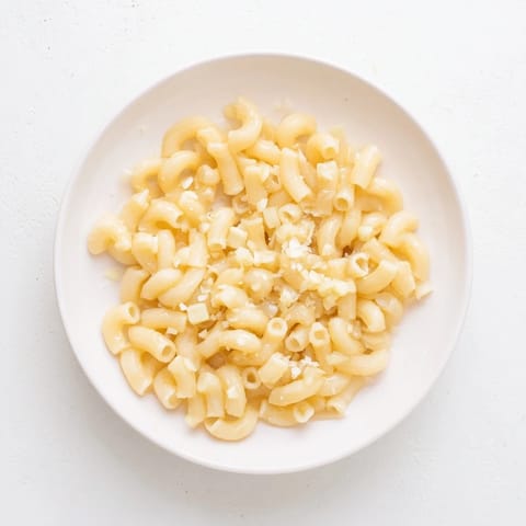 Golden, buttery ditalini pasta with fragrant garlic, a simple and satisfying Italian-inspired meal.