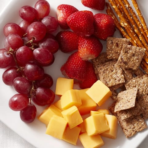 Vibrant Fox & Friends snack tray boasting colorful fresh fruits, veggies, and savory bites ready to enjoy.