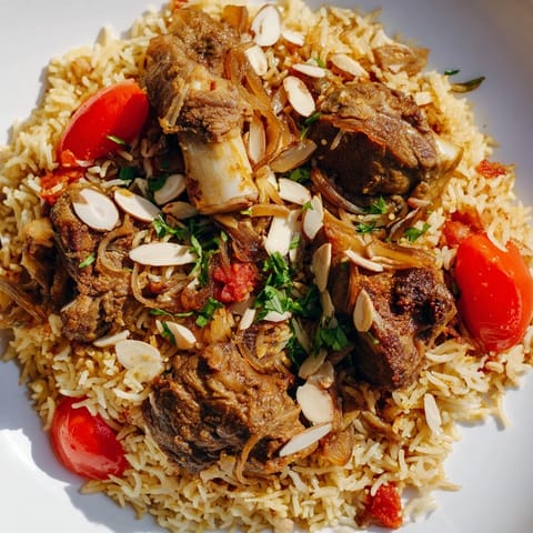 Rich, slow-cooked Qatari Majboos: showcasing savory lamb and fluffy rice infused with traditional spices.