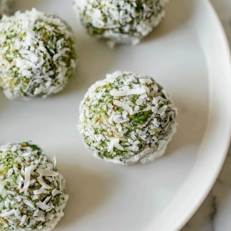 Homemade Coconut Matcha Snowball fat bombs, perfect bite-sized treats to cool, taste, and enjoy!